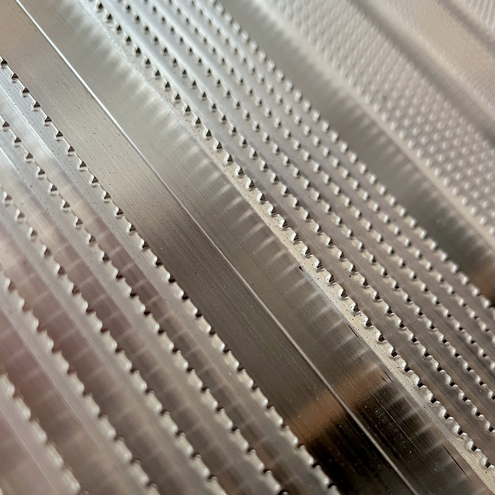 Picture of Alloy Ramps industry standard, serrated, slip-resistant floor.