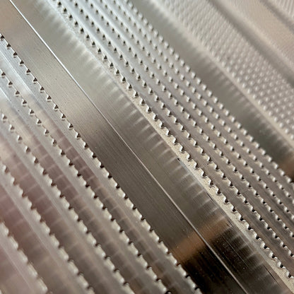 Picture of Alloy Ramps industry standard, serrated, slip-resistant floor.